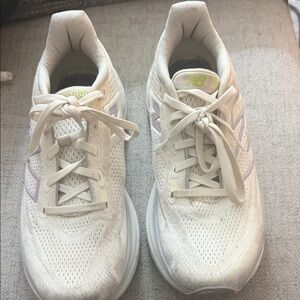 New Balance HOKA running shoes - Off-White Sneakers with Purple accents